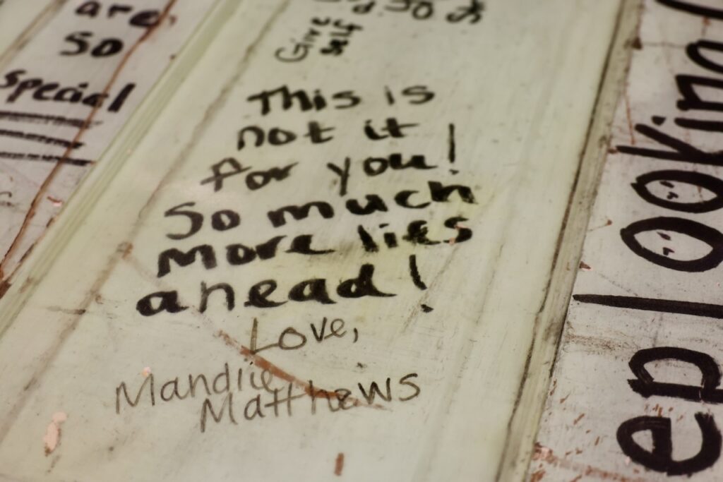 Sanctuary Night’s kitchen table has messages of hope from people who’ve escaped sex trafficking. Mandie Knight has written This is not it for you! So much more lies ahead! Love, Mandie Matthews.