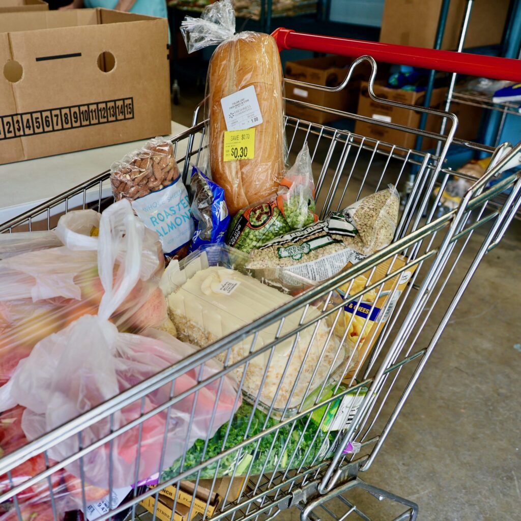 grocery cart full of food from Gladden Food Pantry